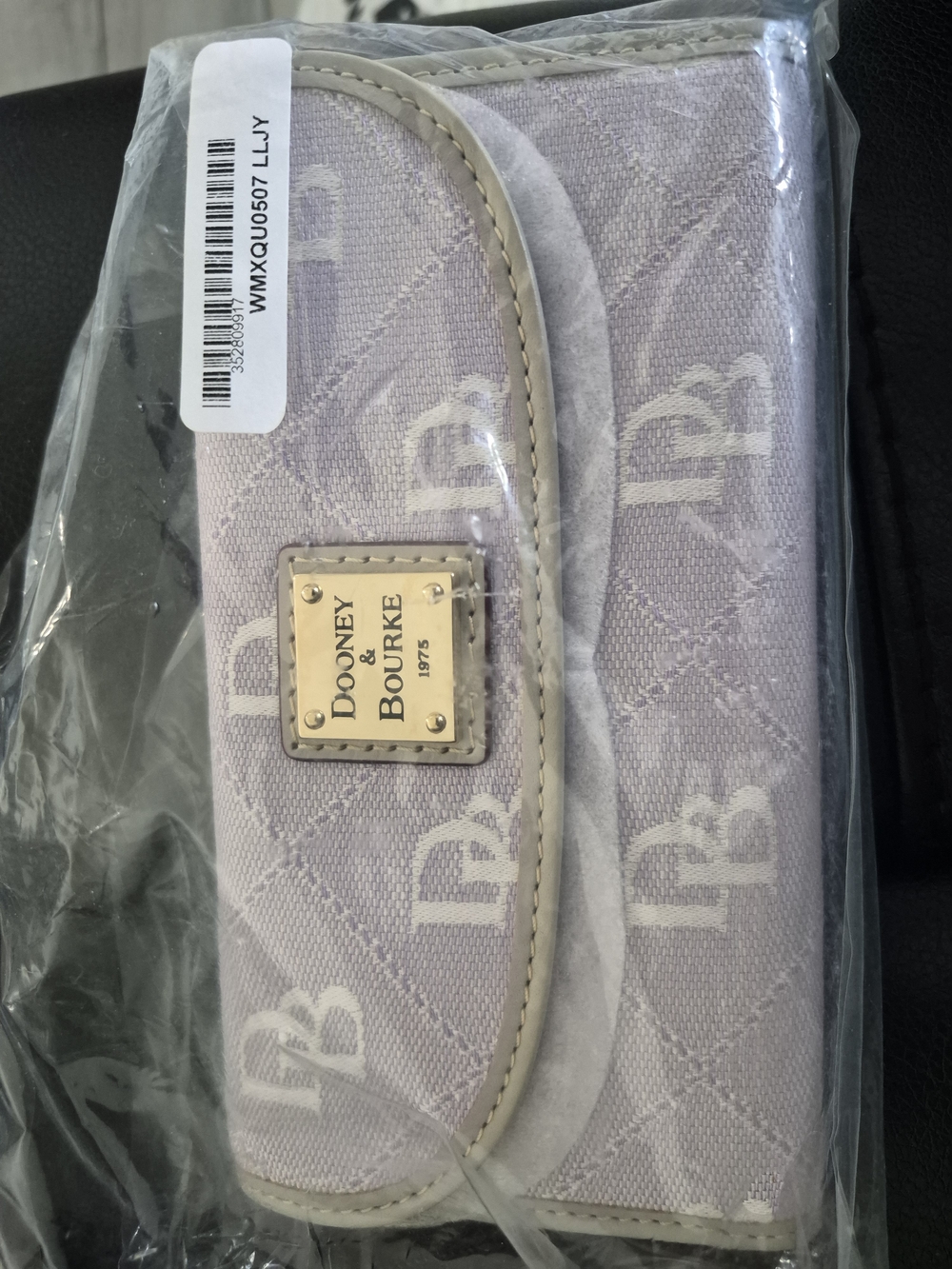 Dooney & Bourke Lilac Signature Continental Clutch Wallet with Gold Plaque